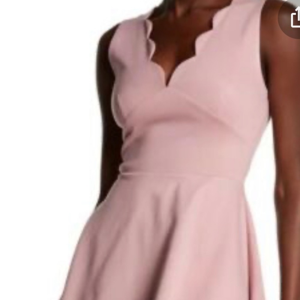 love…ady pink scalloped dress.